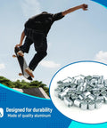 Skateboarder above ramp, inset of 50 Pcs Skate Spacer Set Aluminum Wheel Bearing Spacers and Speed Rings for Skateboards and Longboards.