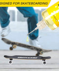 Premium 1 Ounce Skateboard Bearing Lubricant with precision needle applicator shown with skateboard and skater in the background