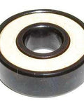Close-up of 8-Pack Skateboard Black Bearings - Bronze Cage & white Seals 8x22x7mm showing black housing and removable seal.