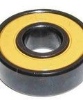 8-Pack Skateboard Black Bearings - Bronze Cage & yellow Seals 8x22x7mm side view showing black bearing with yellow seal