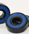 8-Pack Skateboard Black Bearings - Bronze Cage & Blue Seals 8x22x7mm showcasing removable blue seals and black design.