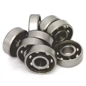 8 Skateboard Chrome Steel Open Ball bearing - Nylon Cage in a stacked arrangement showcasing their chrome finish.