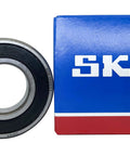 SKF 6205 2RSH C3 double rubber seal bearing alongside branded box, 25x52x15mm size