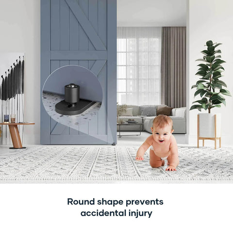 Sliding Barn Door Bottom Floor Guide with ball bearings, installed in a living room, showcasing flush flat bottom design, safe for children.