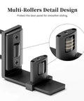 Sliding barn door bottom floor guide with adjustable U shape, flush wall mounted design, showing dual concealed pulleys in black finish.