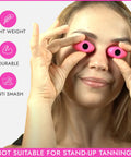 Woman wearing Slim UV Eye Shields For Tanning Beds And Red Light Therapy FDA Compliant Pink, highlighting lightweight and durable features.