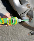 Applying Slime 10011 Flat Tire Puncture Repair Sealant, Emergency Repair for Highway Vehicles, Suitable for Cars/Trailers, 16 oz bottle