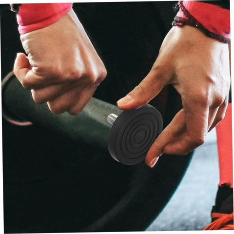 Close-up of Two Pack Slip Resistant Treadmill Leveling Pads being installed on fitness equipment for stable, quiet use.