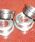 4-Pack Slot Car axle flanged ceramic bearings sized 1/8 inch x 1/4 inch, ABEC-7 quality stainless steel bearings on red background