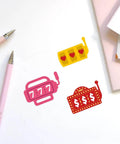 Casino Slot Machine Cutting Dies for Card Making and Scrapbooking, featuring colorful slot machine motifs on white background