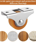 Close-up of 1-inch mini fixed silent ball bearing caster with metal top plate and TPE rubber wheel, shown against flooring options.