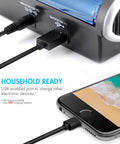 Smart Universal Charger With LCD And 32 NiMH Rechargeable AA AAA C D Batteries charging a smartphone via USB port