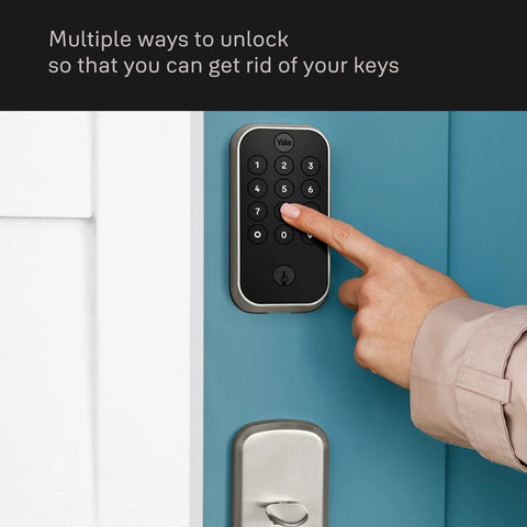 Person using Assure Lock 2 Deadbolt With WiFi Keypad For Smart Home Entry Code Entry And Remote Access Keyless Entry Via Keypad And App Auto Lock And DoorSense Fits Doors By Replacing A Standard Deadbolt Easy Installation For Remote Access And WiFi Connectivity on blue door