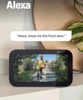 Smart display showing live footage from Battery Doorbell With Head To Toe Video For Home Or Business, compatible with Alexa.