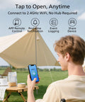 Person using smartphone with Smart WiFi Keypad Front Door Lock With Handle And Auto Lock For Keyless Entry And Voice And Fingerprint Unlock App Remote Control 2 4 GHz Connectivity Digital Front Door Lock Set For Enhanced Home Security app in outdoor setting
