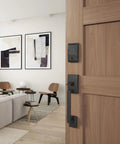 Smart WiFi Front Door Deadbolt With Built In WiFi App Control And Keyless Entry Unlock From Anywhere Through The Connected App Apple Watch Unlock Capability With HomeKit And Alexa Compatible Matte Black Finish Easy Install For Enhanced Security And installed on wooden door in living room view