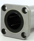 Front view of ✝️ SMSK16GUU 16mm Slide Bush Bushings Miniature Motion Linear Bearing, showing four mounting holes and smooth metal finish.