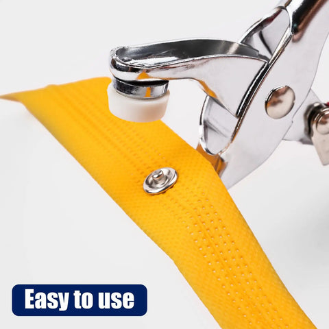 Close-up of pliers and snap on fabric from All In One 9.5mm Snap Button Kit With 200 Pieces In 10 Colors, Includes Pliers And Snap Fastener Tool