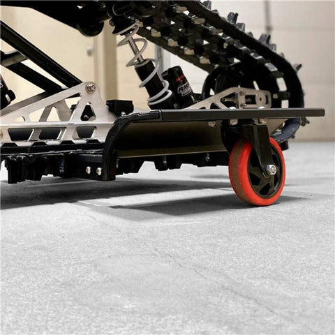 Trax Wheels 2.0 Rear Wheel Casters For Snowmobiles And Snow Bikes, installed, heavy duty, side view with oversized wheels.