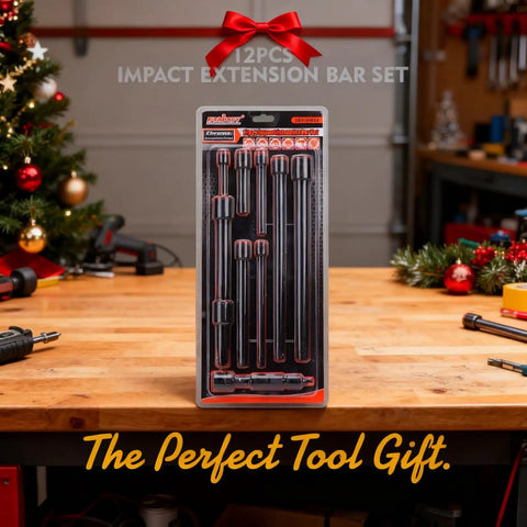 Packaged Heavy Duty 12-Piece Socket Extension Set For Impact Drive displayed on workbench with Christmas decorations.