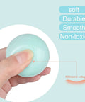 Close-up of a hand squeezing a soft, smooth macaron color ball, highlighting durability and non-toxic properties, 5 Mixed Colors Macaron Ocean Ball (Ship from USA) for Babies Kids Children Soft Plastic Birthday Parties Events Playground Games Pool - 100 Balls.