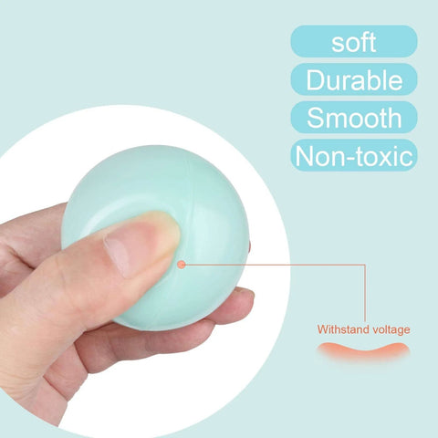 Close-up of a hand squeezing a soft, smooth macaron color ball, highlighting durability and non-toxic properties, 5 Mixed Colors Macaron Ocean Ball (Ship from USA) for Babies Kids Children Soft Plastic Birthday Parties Events Playground Games Pool - 100 Balls.