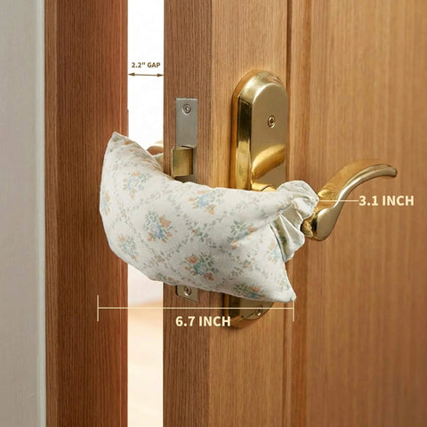 Soft Fabric Door Stopper For Handles With Floral Design Keeps Doors From Slamming And Pinching Fingers Quiet Door Silencer Kid And Pet Safe Farmhouse Style Home Decor shown installed on door handle.