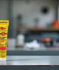 Non Hardening Pipe Thread Sealant With Soft Setting And Slow Drying For Easy Breakout And Lasting Lubrication Of Threaded Joints In Plumbing And Industrial Piping No Metals One Point Seven Five Ounce RectorSeal No 5 25790 in a workshop setting