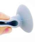 Side view of soft silicone anti-collision door protection pad with a suction cup, designed to absorb door impact and reduce noise.