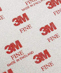 Close-up of Softback Sanding Sponges 4.5 By 5.5 Inch Flexible Foam Wet Dry Fine Grit 20 Pack with 3M logo and fine grit texture