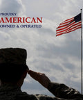 Silhouette of a soldier saluting the American flag with text 'Proudly American Owned & Operated' in the background.
