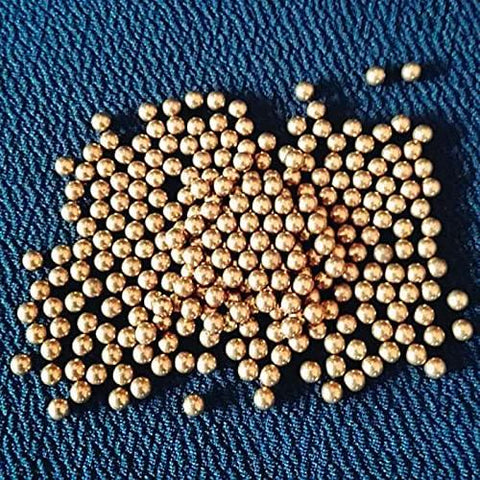 1000-Pack 0.8mm Solid Brass Balls for Electric Switches Machine Precise Copper Ball displayed on a blue fabric surface.