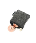 1 inch Solid Copper Baoding Balls with Carry Pouch for Hand Therapy, Exercise, and Stress Relief, partially inside zipper pouch