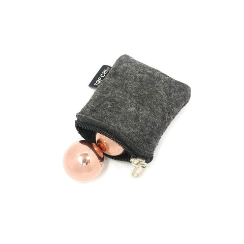 1 inch Solid Copper Baoding Balls with Carry Pouch for Hand Therapy, Exercise, and Stress Relief, partially inside zipper pouch