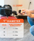Person holding a Sorbothane One Inch Hemisphere Rubber Bumper With Adhesive Backing in front of tech equipment, showcasing vibration isolation specs and durometer chart.