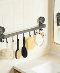 Wall Mounted Utensil Hook Rack with 8 Hooks, No Drill Installation, space gray finish in bathroom holding brushes and sponges.