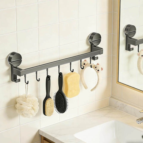 Wall Mounted Utensil Hook Rack with 8 Hooks, No Drill Installation, space gray finish in bathroom holding brushes and sponges.
