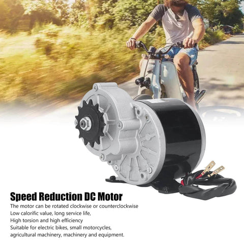 Speed Reduction DC Motor with cyclist background, used in agricultural and industrial systems for smooth power transmission.