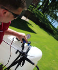 Person adjusting Universal Broadcast Sprayer Pressure Regulator with Quick Connect Bypass Port installed on a lawn sprayer tank