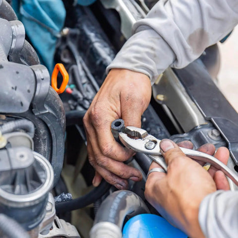 Mechanic installing 50Pcs Spring Band Hose Clamps 6Mm Inner Diameter Colorful Clip Kit on engine vacuum hose