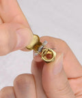 Close-up of a Spring Brass L Shape Oil Cup Cap from BE TOOL, showing durable and rust-resistant design, M12x1.25 thread, ideal for lathe machines.