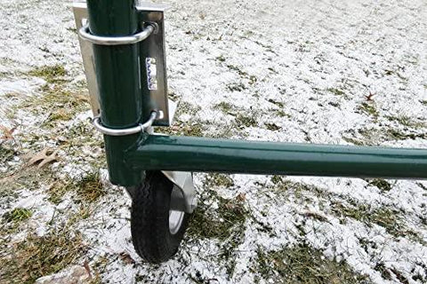Heavy Duty Flat Free Spring Gate Caster with 8-inch wheel mounted on green gate, snow-covered ground