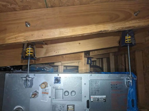 Hanger Mount Vibration Isolator Spring Type for Heavy Duty Vibration Dampening with 300 To 400 Pound Capacity Green Isolator installed