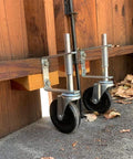 Gate Caster Wheel For 4 Inch And 5 Inch Heavy Duty Spring Loaded Gate Caster With Adjustable Bracket Universal Mount Plate Rubber Wheel 250 To 500 Lbs Load Capacity Suitable For Wooden Gates And Fences Two Pack Or Single Unit installed on wooden gate