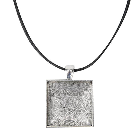 Square metal pendant from Necklace Base Tray Pendant Mold Kit for DIY jewelry making with 60 pieces of metal and plastic shapes, on black cord.