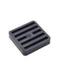 Eight high-hardness natural rubber isolator pads cushion vibration.