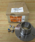 Beefy Industrial Grade Stainless Steel Bushing Holder For Heavy Duty Machinery With Three Inch Height Inner Diameter Two And Three Quarter Inches Outer Diameter Seven Inches Size Seventy Rexnord 4310070HZ placed on table with packaging and bolts