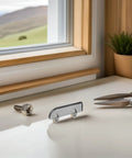 6Pcs Sliding Glass Door Wheels Kit displayed on a table with tools, showcasing the stainless steel roller for cabinet use.