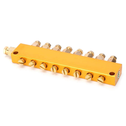Gold-colored oil distributor block with multiple outlets, similar to Stainless Steel Oil Distributor With 1 Inlet And 8 Outlets