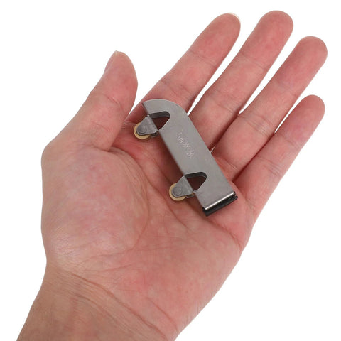 Hand holding part of 6Pcs Sliding Glass Door Wheels Kit For Cabinet Closet Wardrobe Replacement Roller Set With Quiet Silent Operation Smooth Glide
